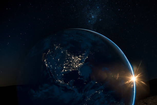 Night view of north America from the satellite to the glowing city lights on the sunrise from the east. Elements of this image are furnished by NASA. Night view of north America from the satellite to the glowing city lights on the sunrise from the east. Elements of this image are furnished by NASA. population explosion photos stock pictures, royalty-free photos & images