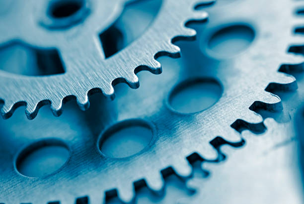istock Two toothed steel gears with copy space 1097255516