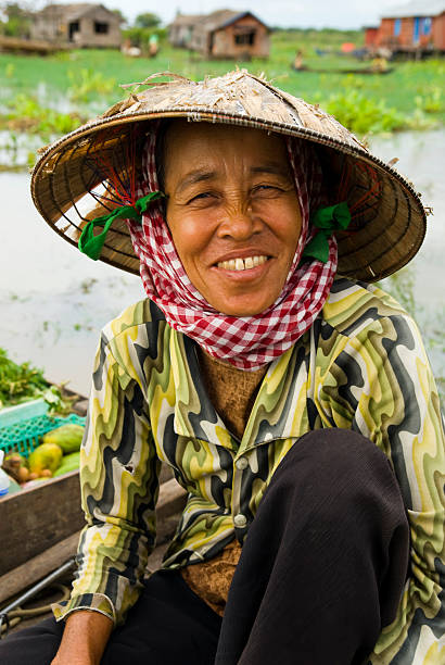 istock Cambodian Woman in Boat 109725563