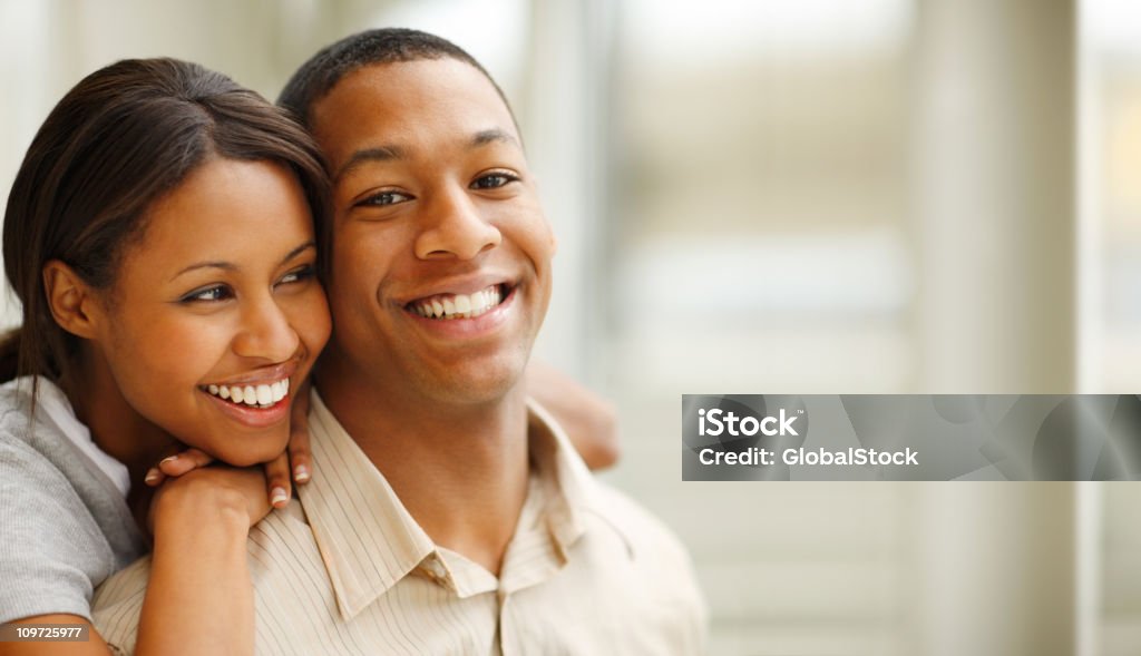Romantic young couple smiling  African-American Ethnicity Stock Photo