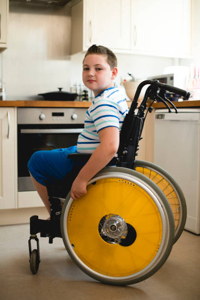 istock Young boy in a wheelchair 1097261390