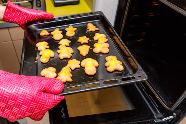 istock Baking christmas gingerbread cookies with hot oven. 1097264252