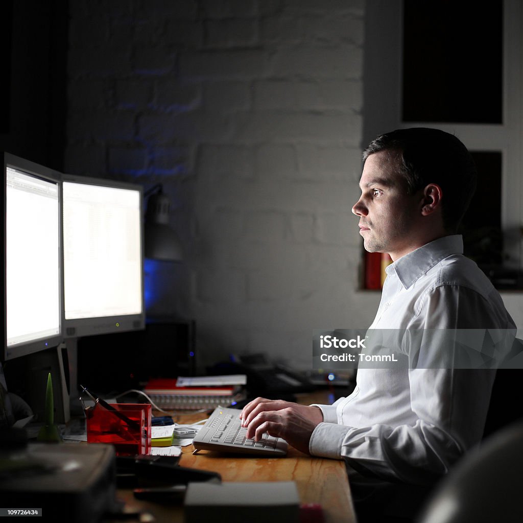 working late  Adult Stock Photo