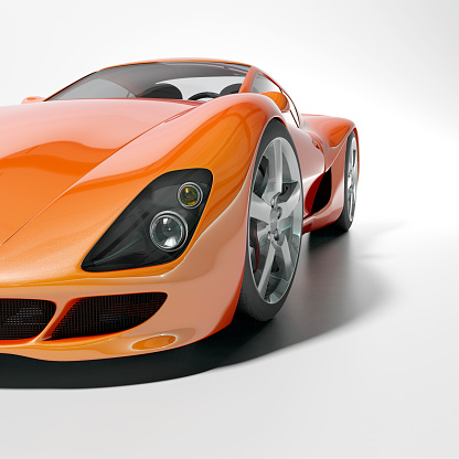 An orange sports car on a white background. My own sports car design. Very high resolution 3D render.