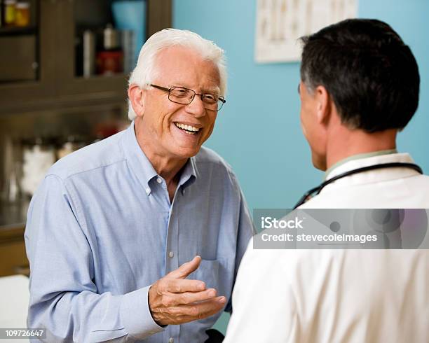 Doctor And Patient Consulting Stock Photo - Download Image Now - Adult, Adults Only, Asking