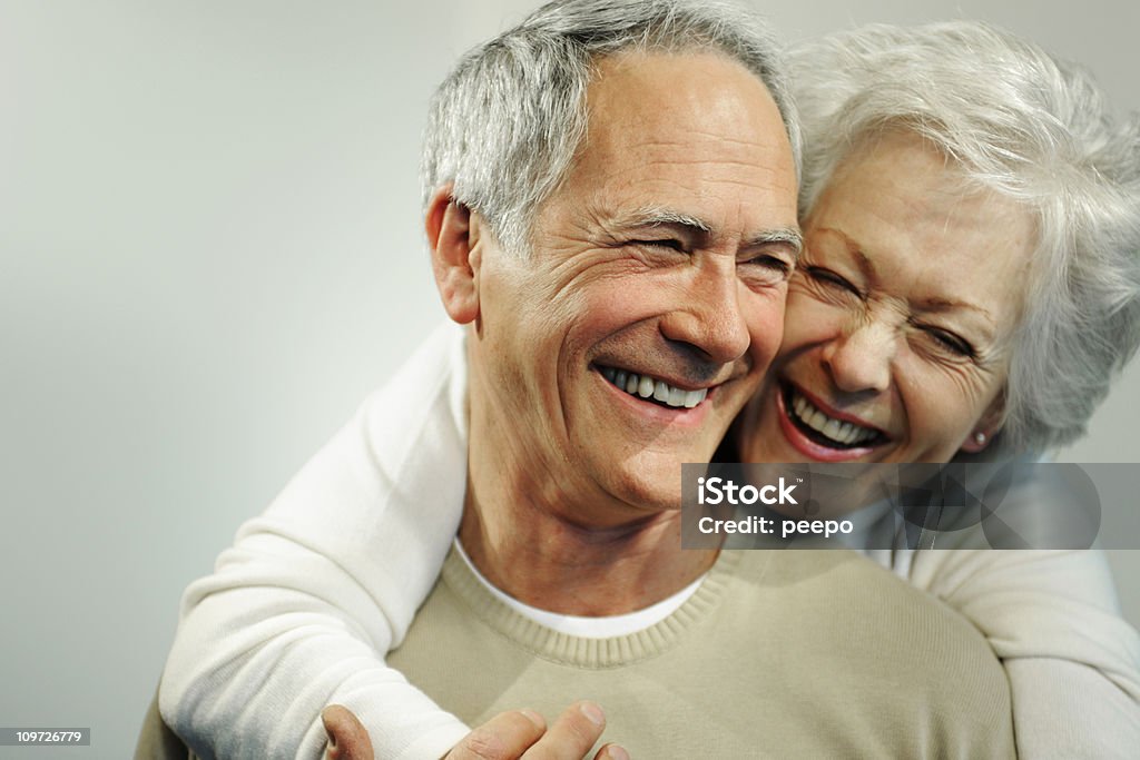 Portrait of Smiling Senior Couple seniors Senior Adult Stock Photo