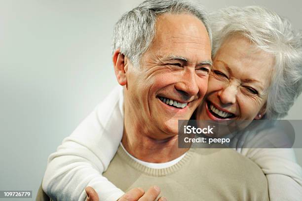 Portrait Of Smiling Senior Couple Stock Photo - Download Image Now - Senior Adult, Human Face, Happiness