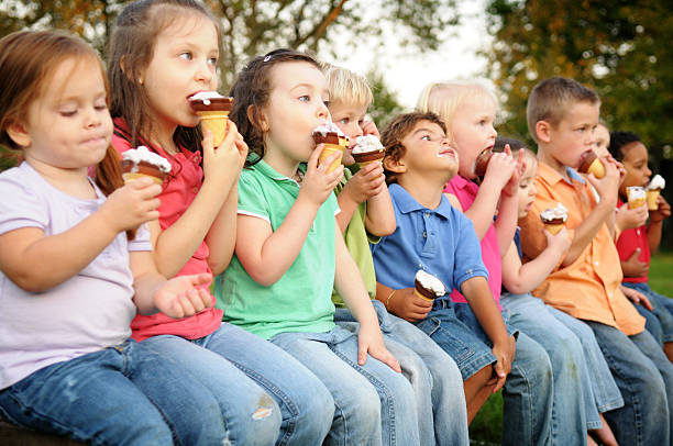 istock Group of Children Eating Ice Cream Cones Outside 109726863