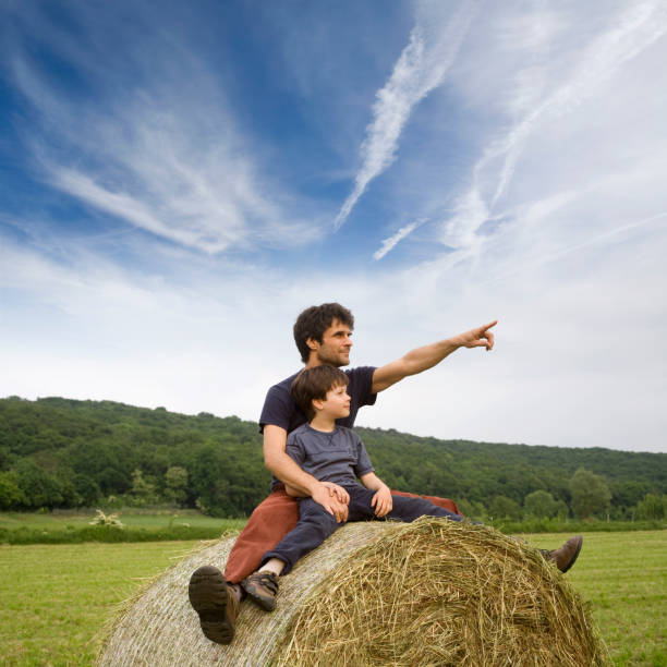 Son learning from his father. Photography in high resolution. 