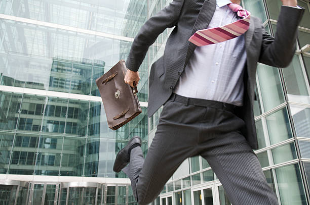 istock Stressed Businessman Rushing Outdoors From the Office Courtyard 109726919