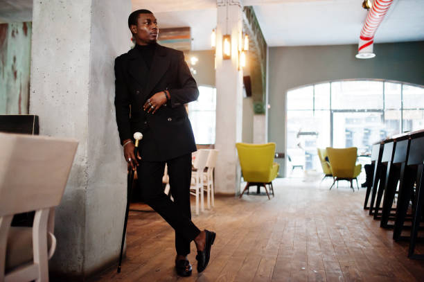 istock Stylish african american gentleman in elegant black jacket 1097270056