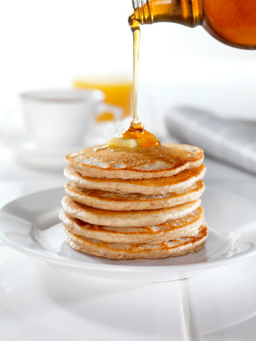 Whole Wheat Pancakes with Syrup and Butter,Coffee and Orange Juice -Photographed on a Hasselblad H3D11-39 megapixel Camera System