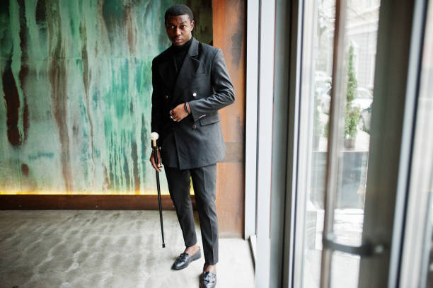 istock Stylish african american gentleman in elegant black jacket 1097270350