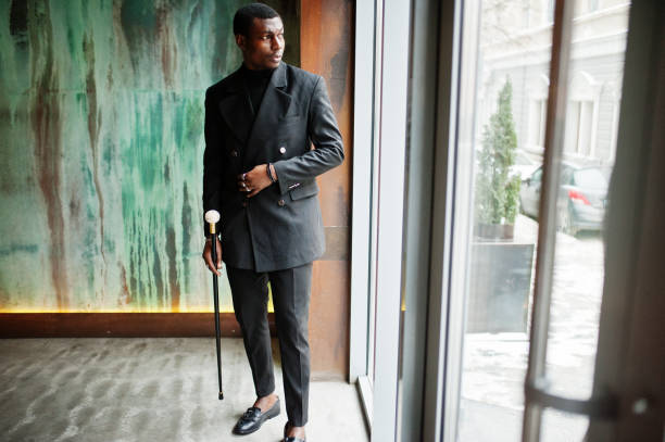 istock Stylish african american gentleman in elegant black jacket 1097270366