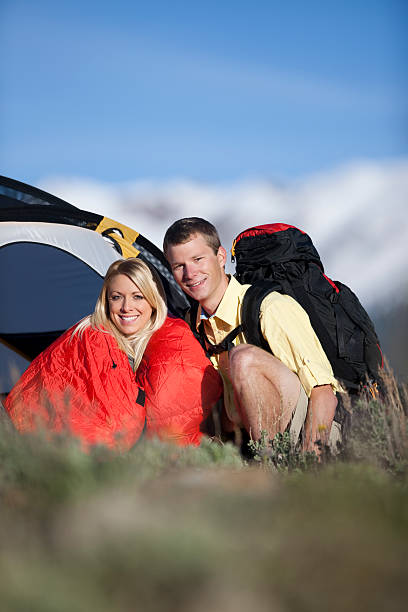 istock HappyYoung Couple Sitting in Front of Dome Tent 109727082