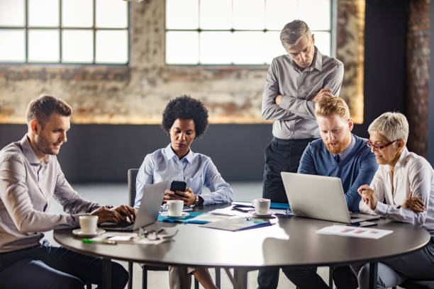 istock Business colleagues using wireless technology on a meeting in the office. 1097271880
