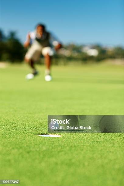African American Golf Durante Un Partido De Golf Foto de stock y más banco de imágenes de Golf - Golf, Golfista, Movimiento