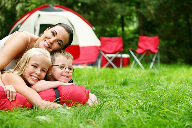 istock Mother at camping site with family 109727549