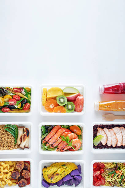 istock Prepared meal delivery concept. Top view of ready to eat dishes on white background with copy space. 1097278628