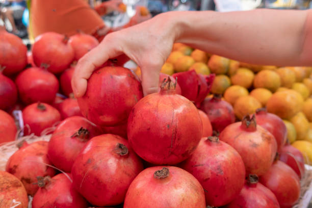 istock The pomegranate, or Punica granatum, is a shrub that produces a red fruit 1097280382