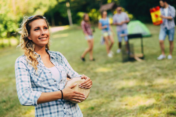 istock Woman playing drums having fun in nature 1097282630