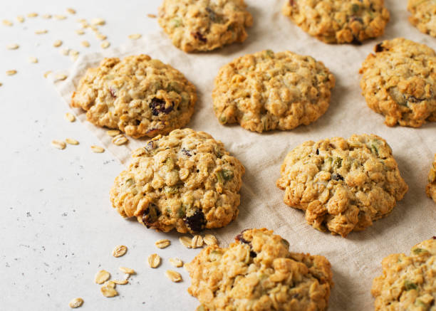 istock Homemade oat cookies on white background 1097285016