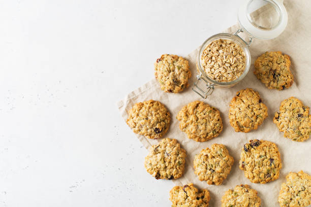 istock Homemade oat cookies on white background 1097285038