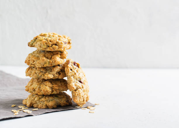 istock Homemade oat cookies on white background 1097285106