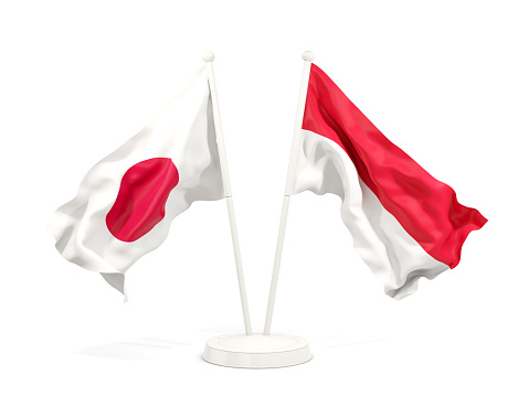 Two waving flags of Japan and indonesia isolated on white. 3D illustration