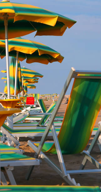 istock many sun umbrellas and deskchairs 1097295390