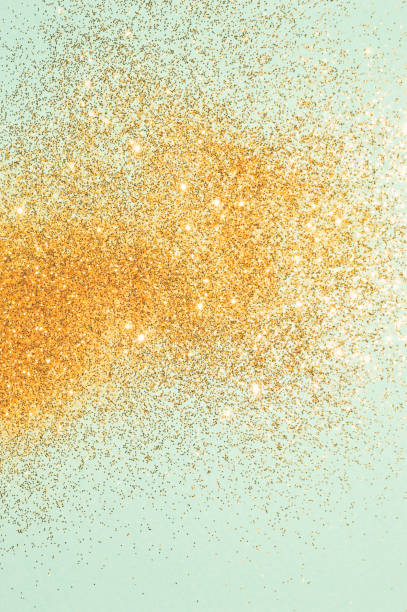 istock Gold glitter on blue background in vintage colors 1097298710