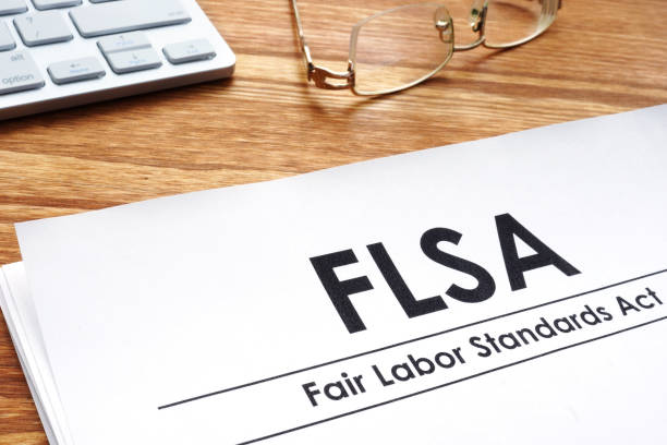 istock Fair labor standards act FLSA on a desk. 1097298754