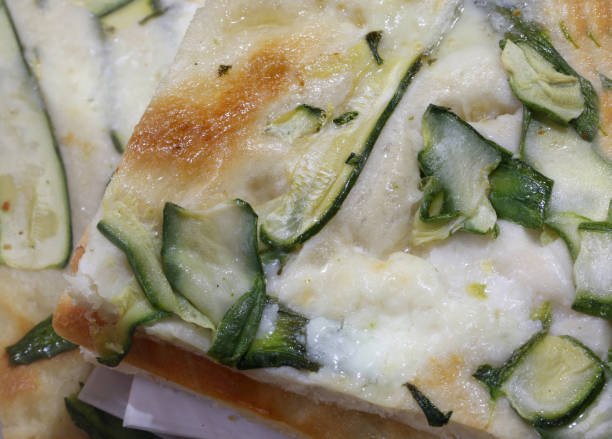 istock focaccia with fresh cheese spread and zucchini baked 1097301120