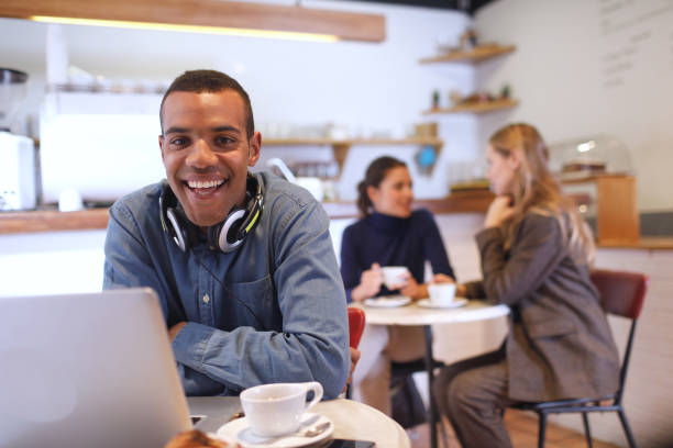 istock Lifestyle portrait looking at camera in a coffee shop. 1097310742