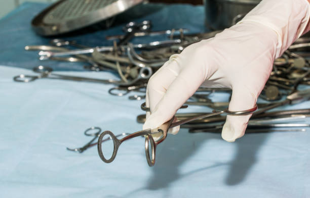 istock Ancient medical surgical instruments. Surgeon at work 1097313738