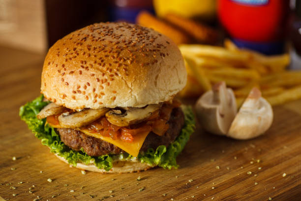 istock Beef Burger with Cheddar Cheese and Mushroom 1097316332