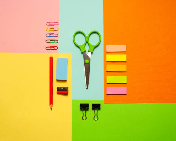 istock Close-up of multi-colored stationery laid out on pieces 1097316352