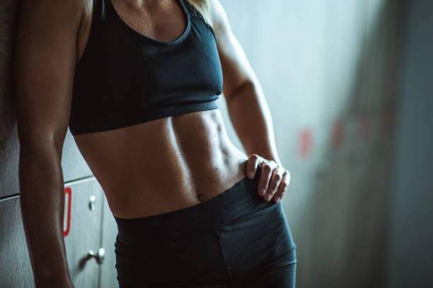 istock Unrecognizable athletic woman with abdominal muscles. 1097317318