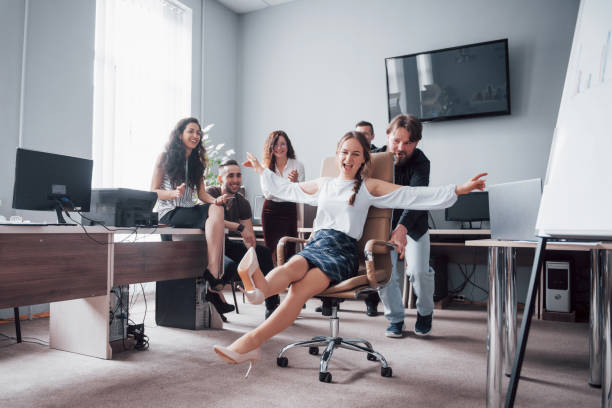 istock Happy young colleagues smile and have fun at the creative office. 1097318616