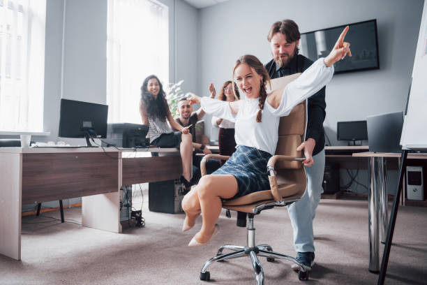 istock Happy young colleagues smile and have fun at the creative office. 1097318632