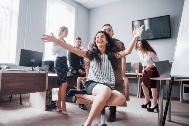 istock Happy young colleagues smile and have fun at the creative office. 1097318816