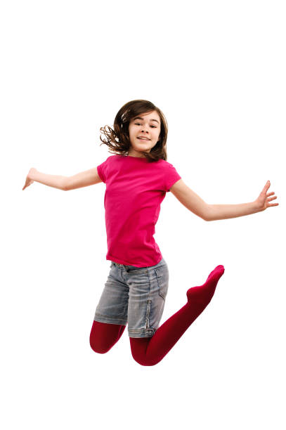 istock Girl jumping isolated on white background 1097321086