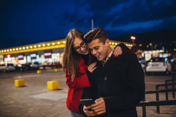istock Cute young couple outdoors 1097323376