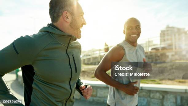 Lets Get To Those Goals Stock Photo - Download Image Now - Men, Running, Healthy Lifestyle