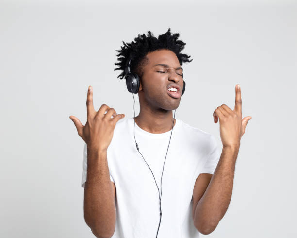 istock Man having fun listening to music 1097328468