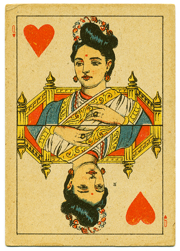 Hindu Queen of Hearts, wearing a headdress. This playing card has square corners, typical of the mid- to late-19th century. Ravi Varma Press began in 1892 but was already deep in debt by 1899. The press was sold and the factory went up in flames in 1972.