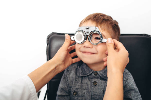 istock Caucasian boy receiving eye exam at doctors office 1097329528