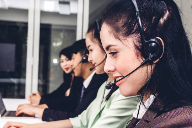 istock Beautiful businesswoman customer support services working with headset and computer at call center 1097336282