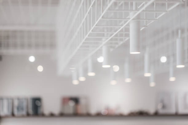 istock Decorative modern lights bulb in a white room, 1097336442