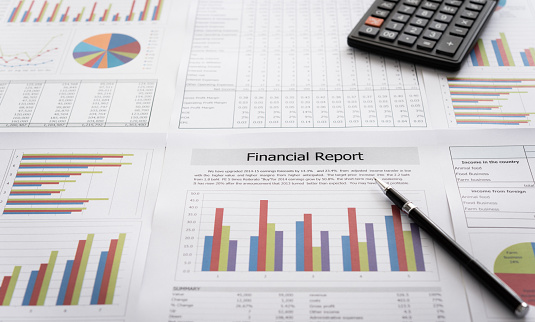 Data Analysis. Pen with business report on financial advisor desk. Concept of business planning , accounting, business analysis,financial planning services.